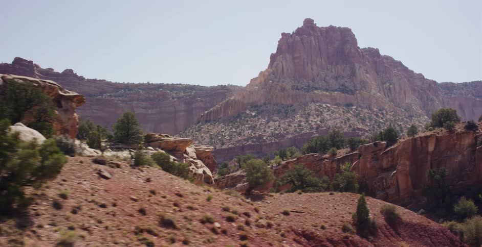 A scenic drive reveals the vast, rugged red rock landscape of Capitol Reef National Park in Utah
