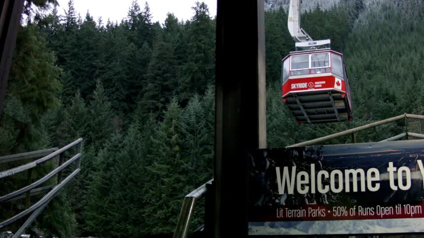 Ski lift travels down a mountain