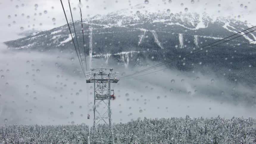 View of a snowy mountain and a ski lift