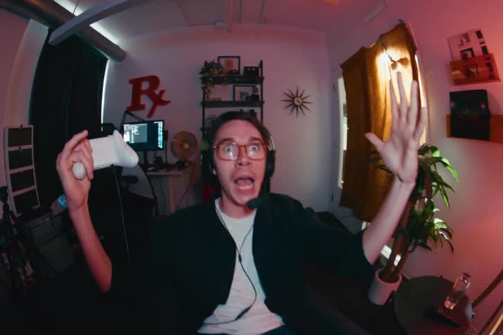 A point-of-view shot from a webcam shows a gamer's hilarious and intense reactions to a video game