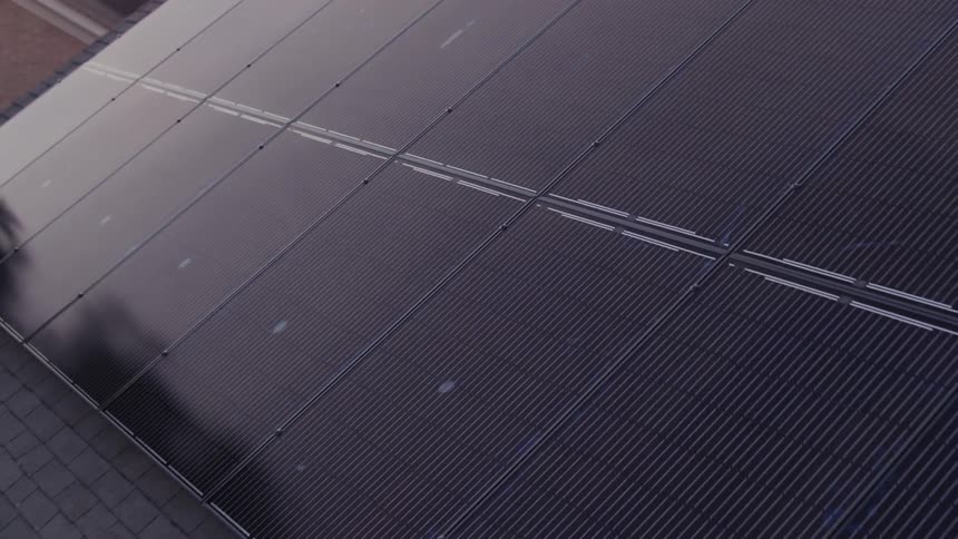 Solar panels line this roof