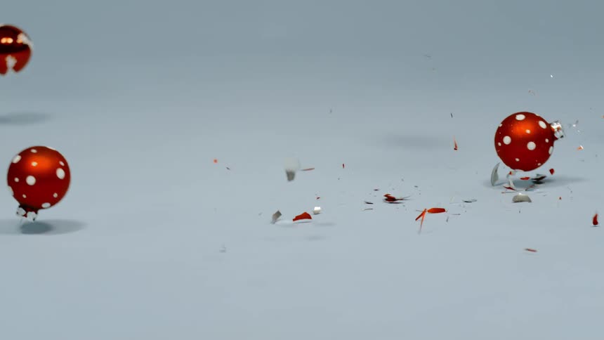 Christmas ornaments fall to the ground and shatter