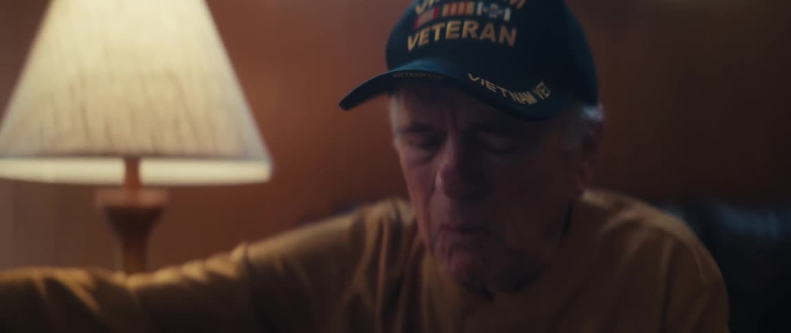 An elderly Vietnam veteran and his wife receive difficult news while looking over a brain scan with a doctor