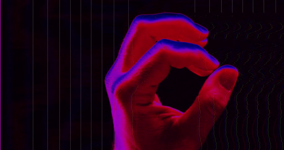 A distorted, neon-colored hand slowly closes into a fist with abstract glitch and wave-form effects