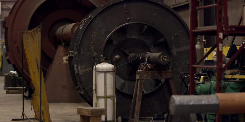 A large machine sits in a shop