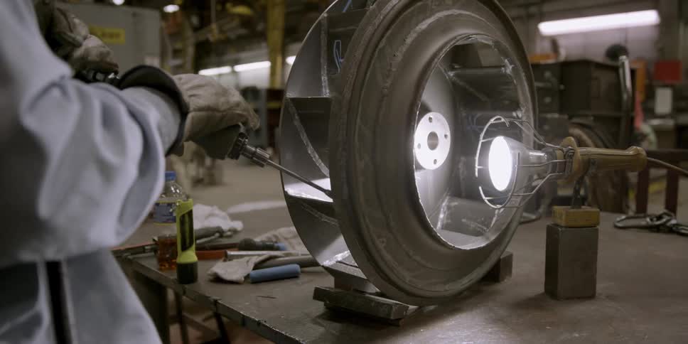 A man works in a factory