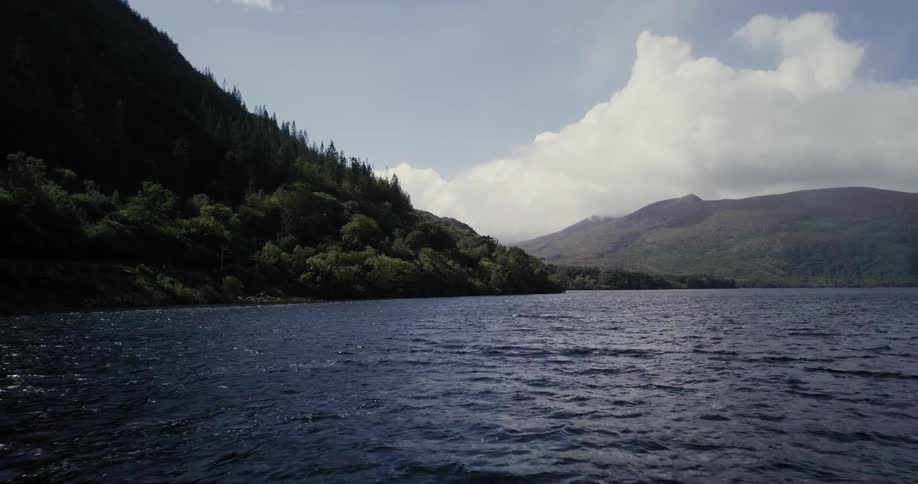 Water flows on a mountain lake