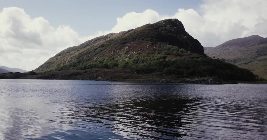 The lake water is calm with only small waves