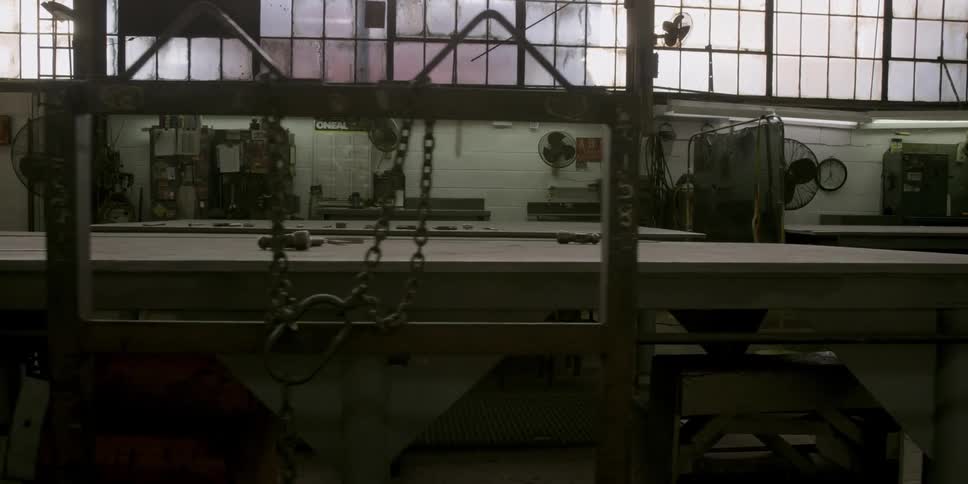 Tables are shown in a factory setting