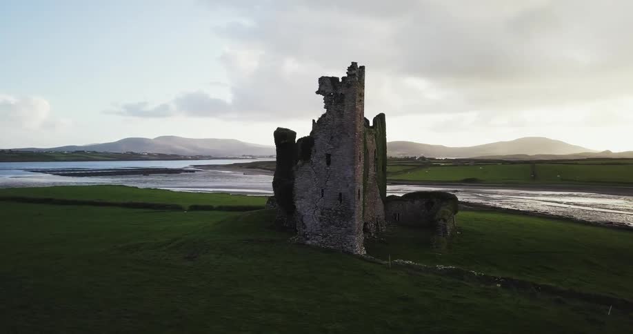 A building is broken down on a green pasture