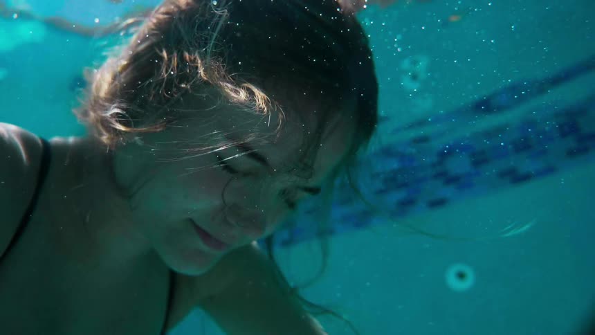 A woman is floating in the water