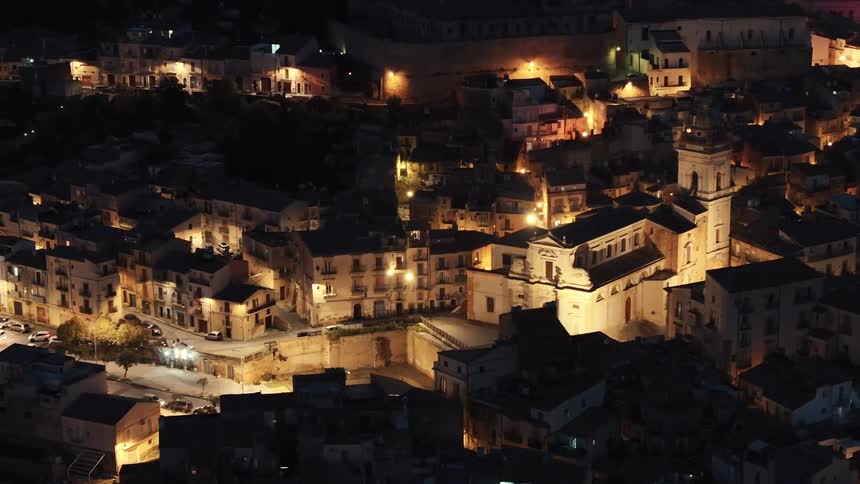 A stunning timelapse of the historic Sicilian town of Modica, with its beautiful church and buildings illuminated by warm lights at night