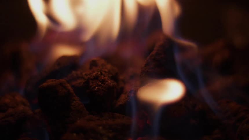 A fire produces ash at night