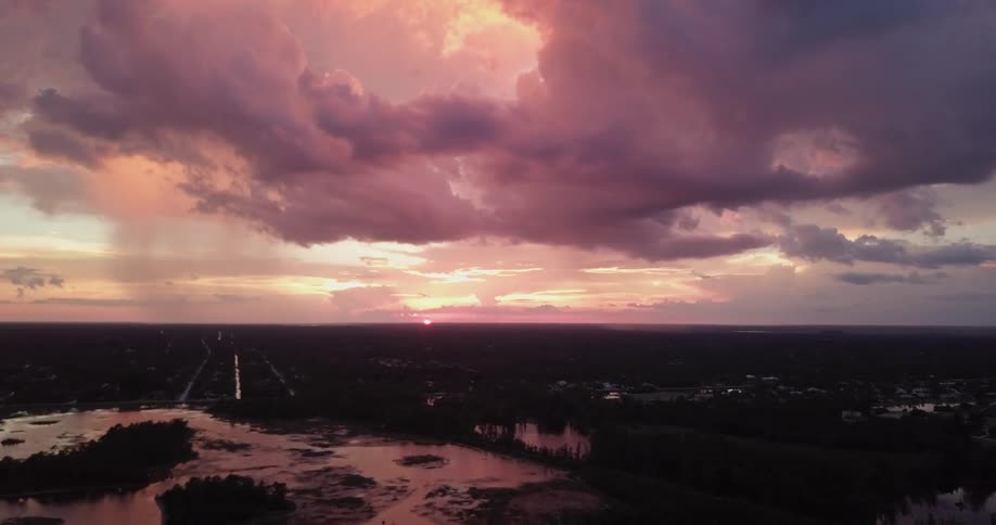 The sunset sky is giving off a red hue