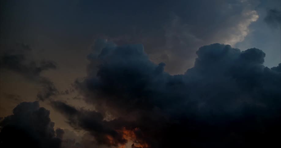 Clouds move around blending together in the sky