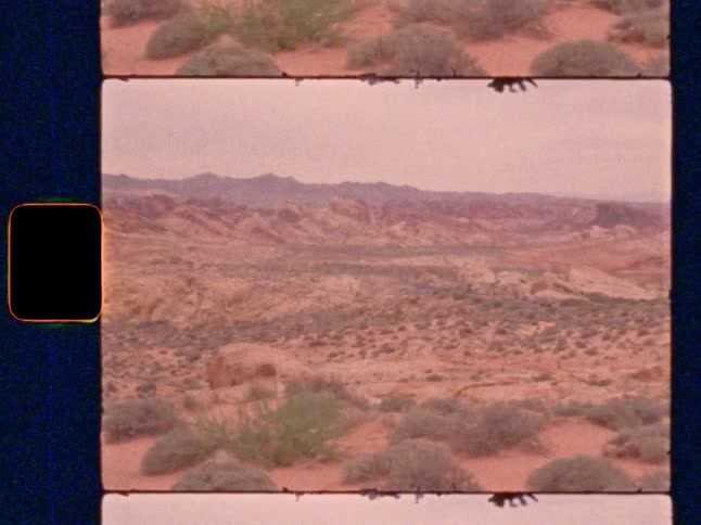 A Super 8 film pan across the vast, arid landscape of Valley of Fire State Park in Nevada