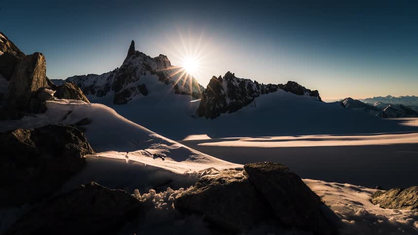 A beautiful timelapse captures the sunrise over the iconic Dent du Géant in the Mont Blanc mountain range