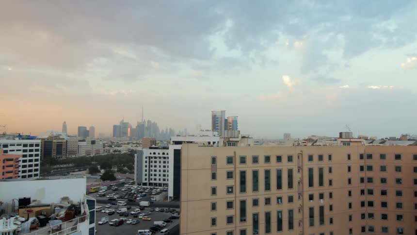 Looking out over the city buildings with taller skyscrapers in the distance