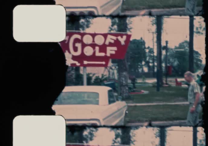 A vintage film captures a happy family getting out of their station wagon to play at a 'Goofy Golf' mini-golf course in the 1970s