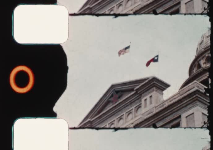 Vintage 1950s footage shows the Texas State Capitol building in Austin, concluding with a shot of two children holding hands as they walk up the steps