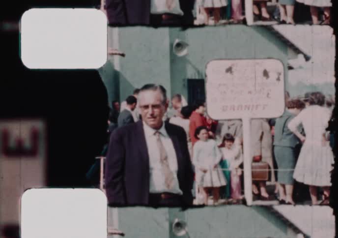 Vintage 1960s footage of a family standing outside the Braniff Airways terminal at the high-altitude airport in La Paz, Bolivia