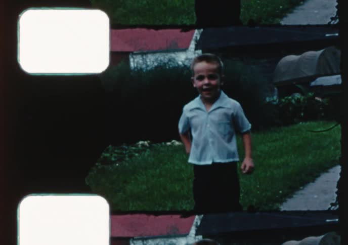 A compilation of home movie clips shows a young girl in her Easter dress and a boy playing in their backyard during the 1950s