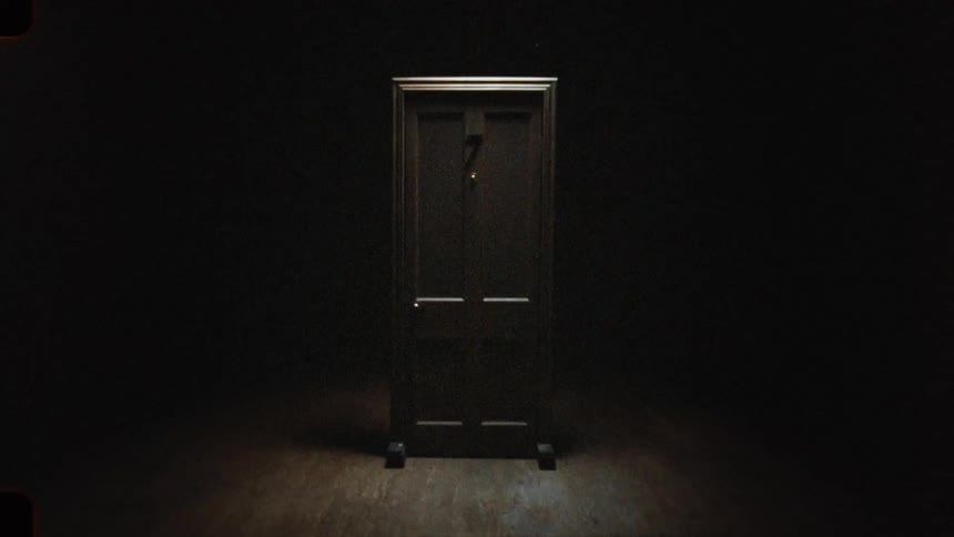 A mysterious wooden door with a question mark symbol stands isolated and spotlit in a dark, empty space
