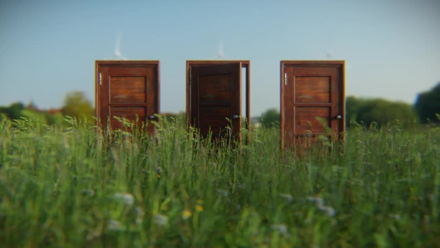A surreal animation of three freestanding wooden doors in a grassy field with wind turbines in the background, where the middle door magically opens and closes