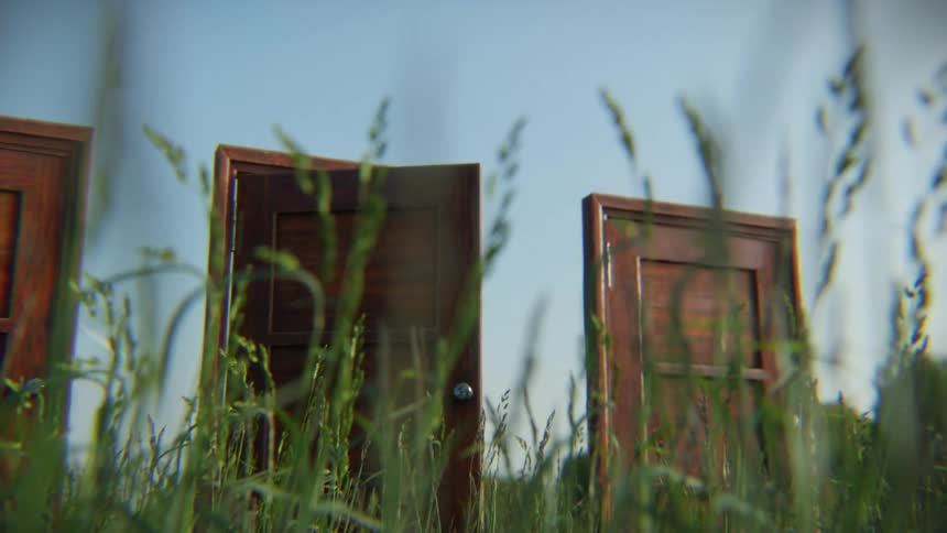 Three surreal wooden doors stand in a tall grassy field as one opens and closes, symbolizing choice and opportunity