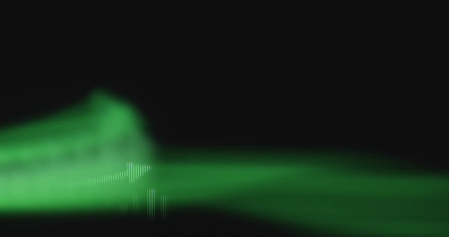 A macro view of a green digital bar graph with an upward arrow indicating positive financial growth and success on a black screen