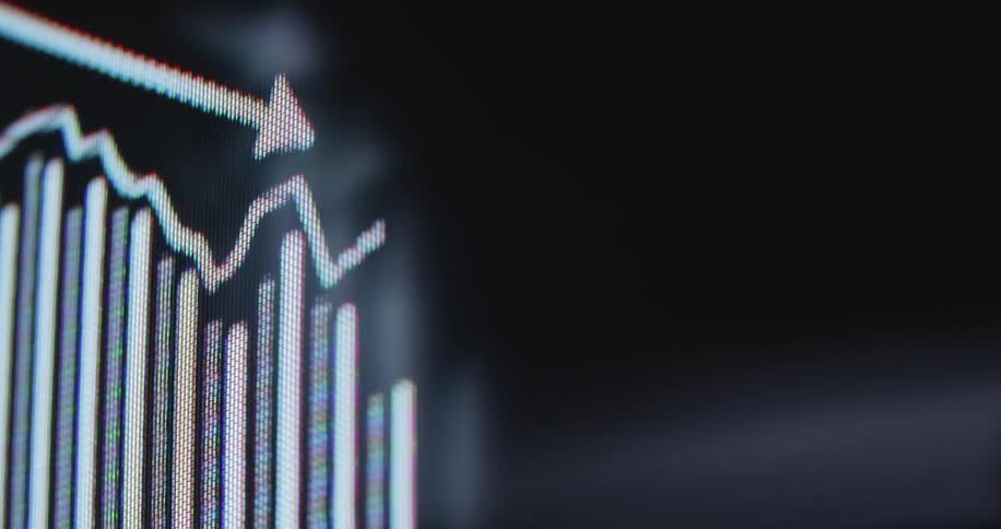 A macro close-up of a digital stock market graph showing a bearish trend with a declining arrow indicating a financial crisis