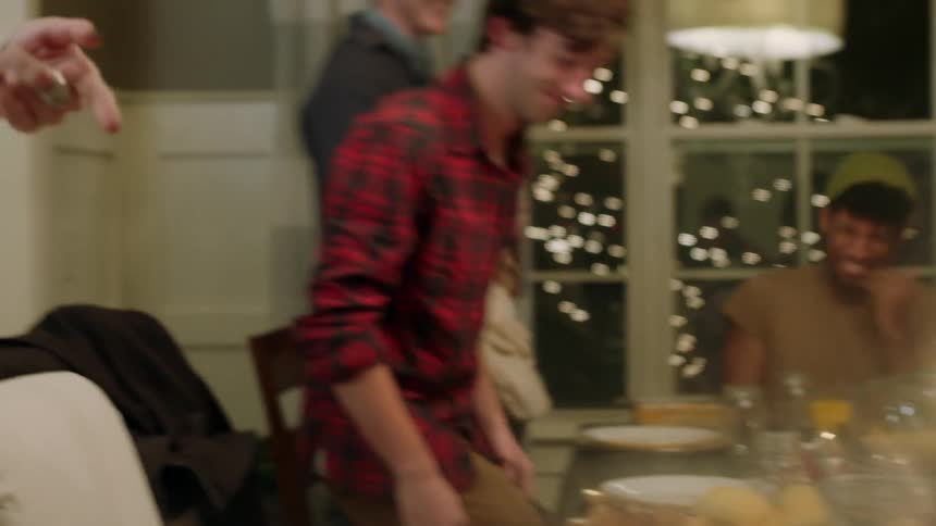 Drinks are served at a christmas dinner party