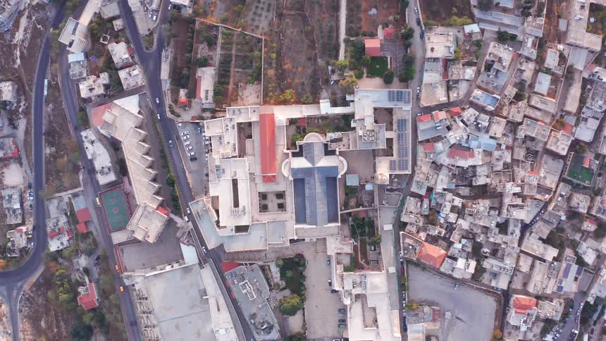 An aerial top-down view of the Basilica of the Annunciation, a prominent Christian landmark in the heart of Nazareth, Israel
