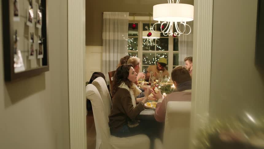 A group dines together at christmas