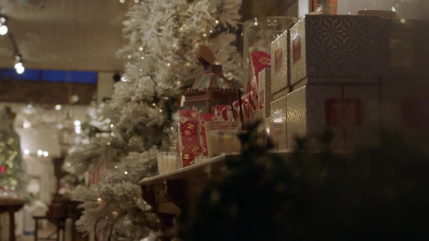 Christmas decorations are displayed in a store