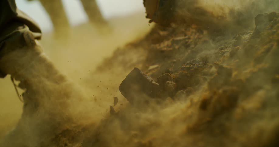 Person running through thick dirt