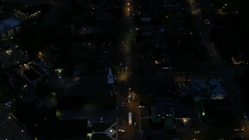 The city below is lit at night
