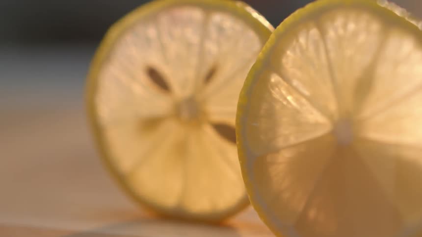 A lemon wedge up close with its seeds