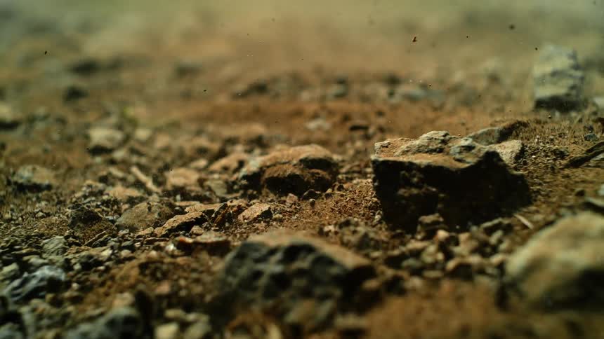 Dirt and gravel vibrate and jump