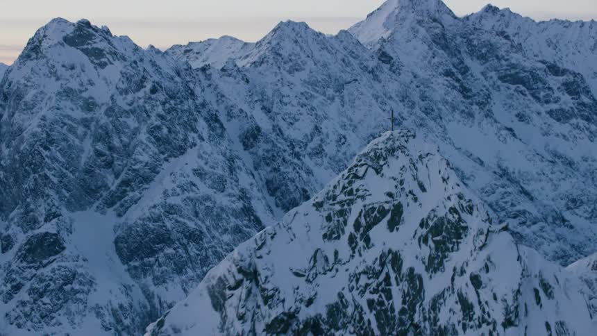 The mountains are sharp and covered with ice