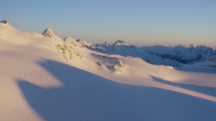 Snow covered mountains on clear day