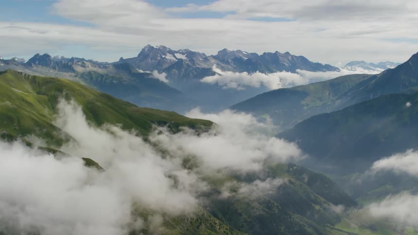 Clouds sit on the top of the mountains