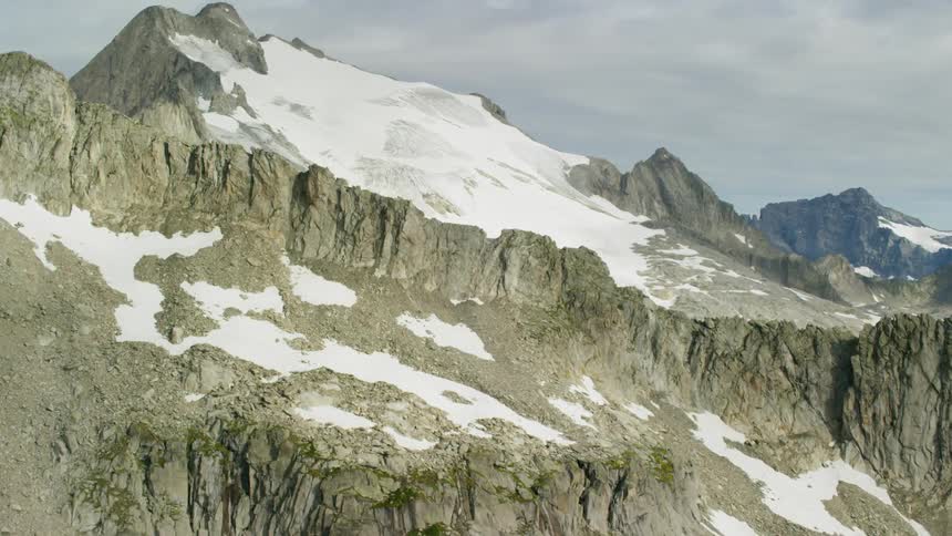 The tall mountain has ice on top