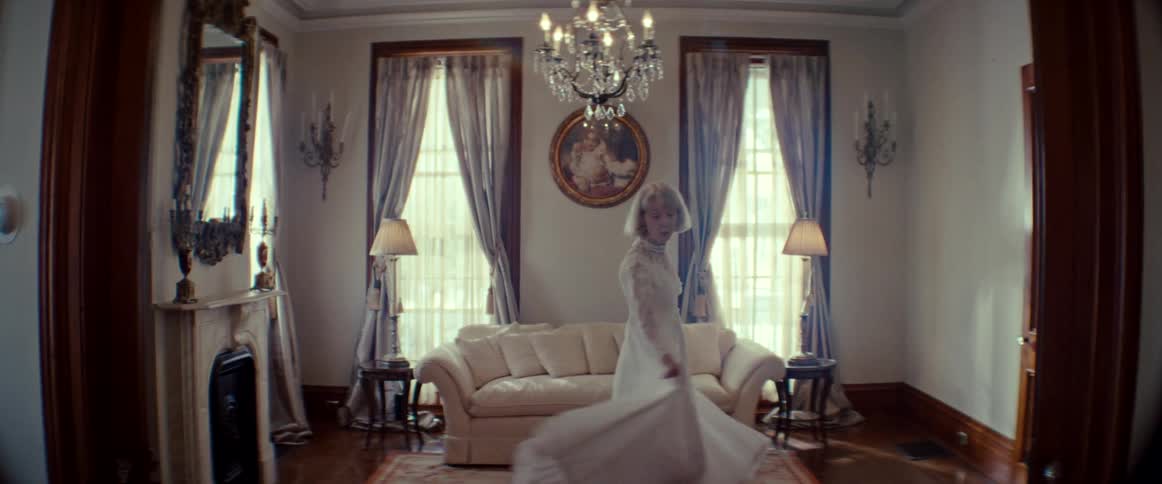 A nostalgic elderly woman in a vintage wedding dress slowly twirls in an opulent room, reminiscing about her wedding day