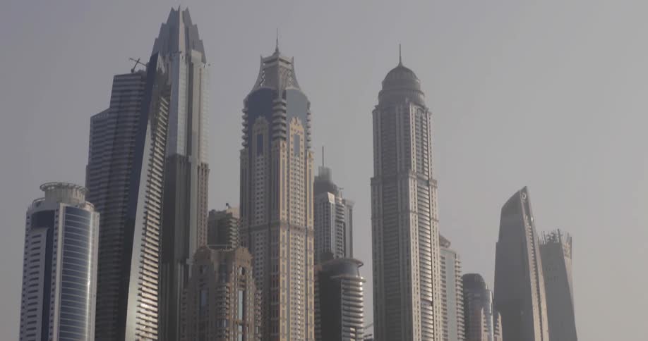 Very tall buildings are across the water