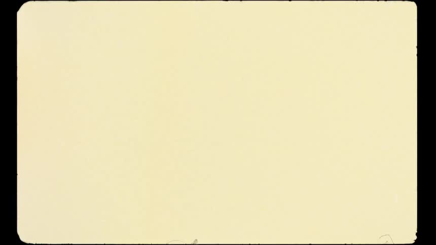 A vintage 8mm film overlay with authentic light leaks, scratches, dust, and film burn effects
