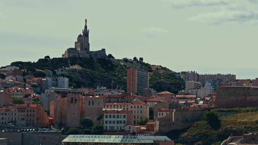 A beautiful timelapse of the iconic Notre-Dame de la Garde basilica overlooking the historic city of Marseille, France
