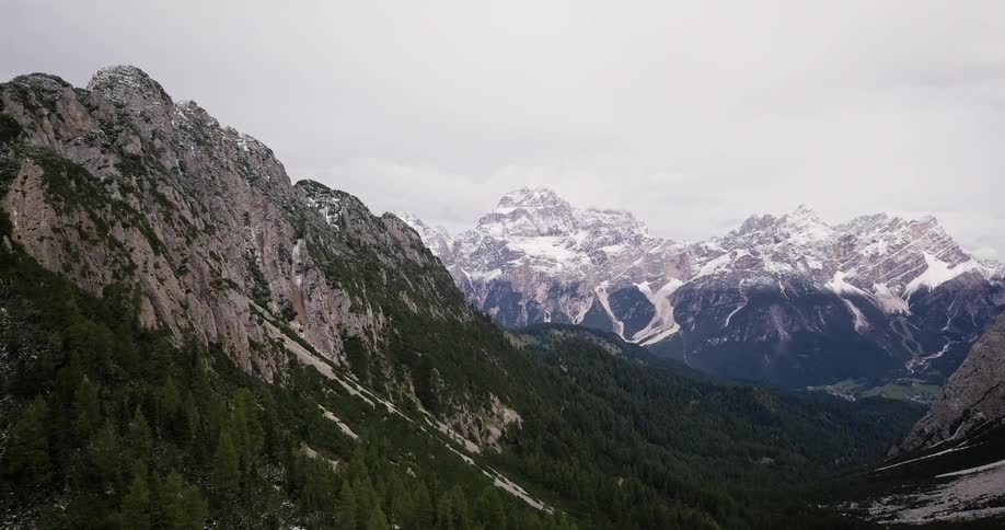 An aerial view of a mountainous landscape on a cloudy day