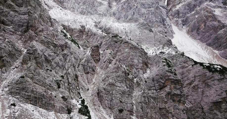 The mountain is covered with frost