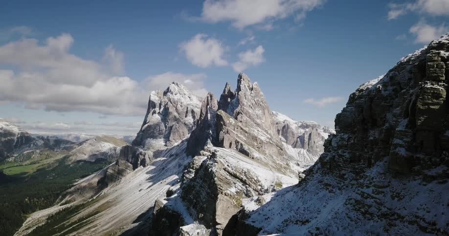 Jagged mountain peaks against blue sky